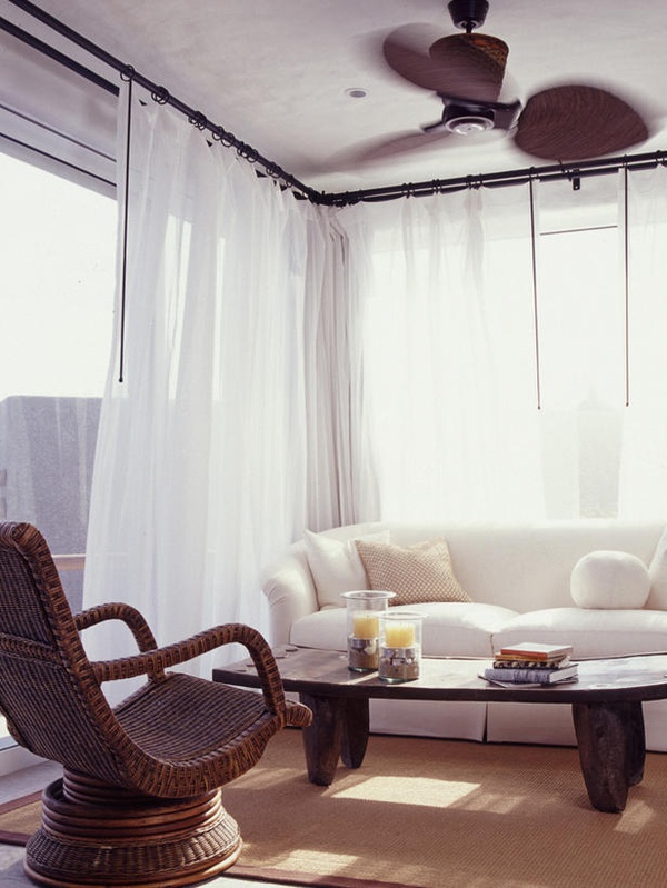 White sofa and drapery with sisal rug